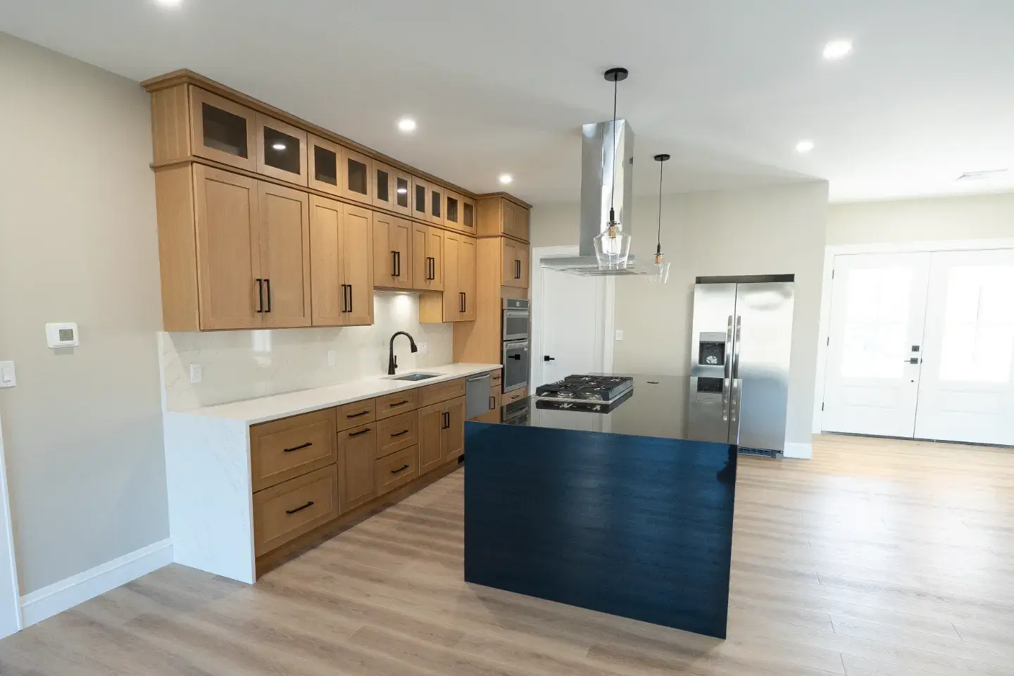 White oak shaker kitchen with navy island